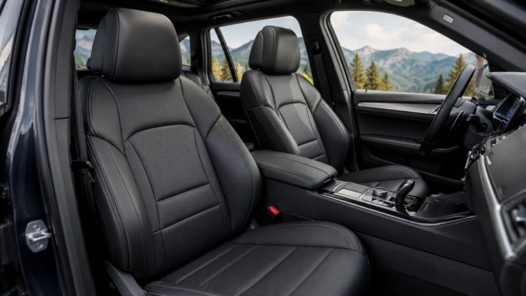 Premium black leather-style seat covers installed in a modern vehicle interior
