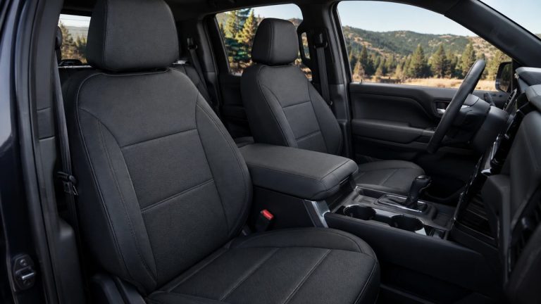 Fitted black seat covers installed in a modern SUV interior