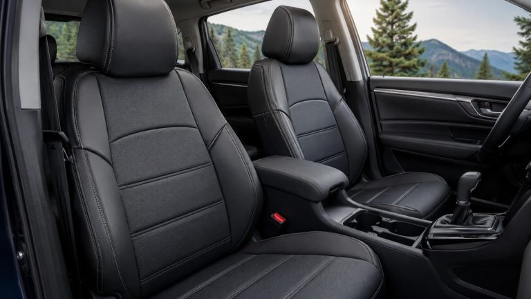 Premium custom fit black seat covers installed in a modern vehicle interior