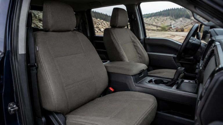 Durable fitted seat covers installed in a pickup truck interior