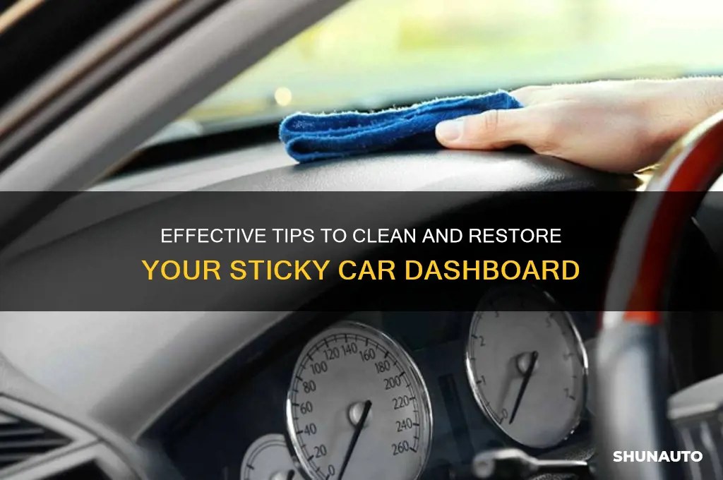 Hand wiping a microfiber cloth across a car dashboard with leather and plastic surfaces.