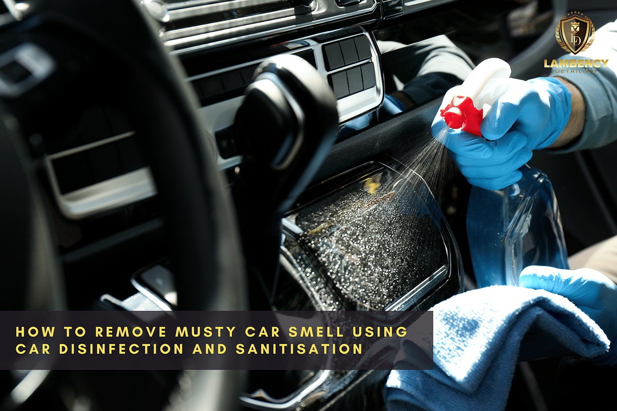 Car cleaning spray bottles and brushes placed on a car seat showing fabric and leather surfaces