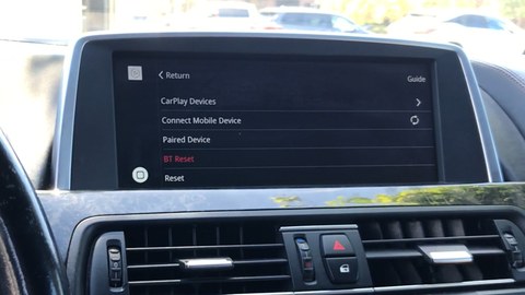 Comparison chart of soft reset and factory reset options for a wireless CarPlay adapter