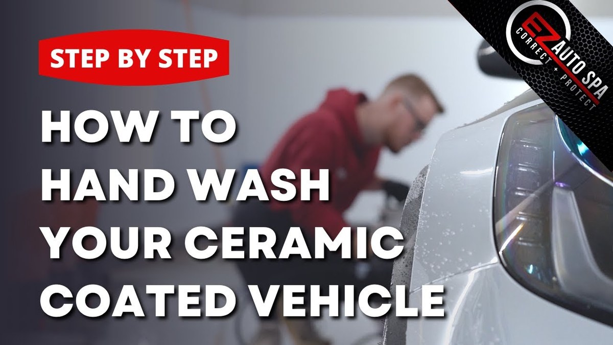 Detailer applying ceramic coating to a car door panel with an applicator pad.