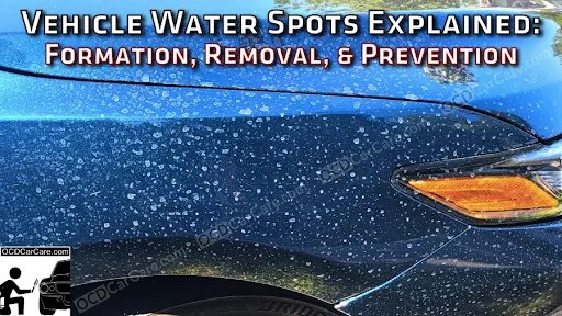 Hand applying a microfiber cloth to remove water spots from a ceramic coated car hood.