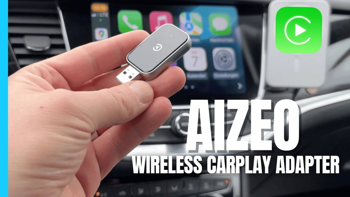 Wireless CarPlay adapter connected to a car USB port showing CarPlay apps on the factory display